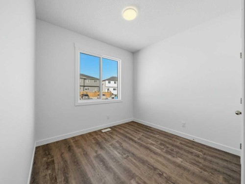 105 Creekstone Manor Sw, Calgary, AB - Indoor Photo Showing Other Room