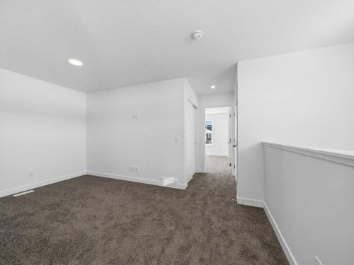 105 Creekstone Manor Sw, Calgary, AB - Indoor Photo Showing Other Room