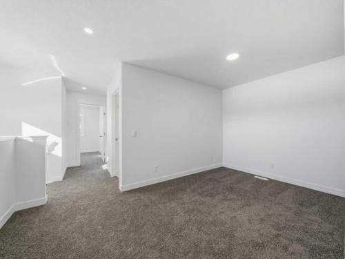 105 Creekstone Manor Sw, Calgary, AB - Indoor Photo Showing Other Room