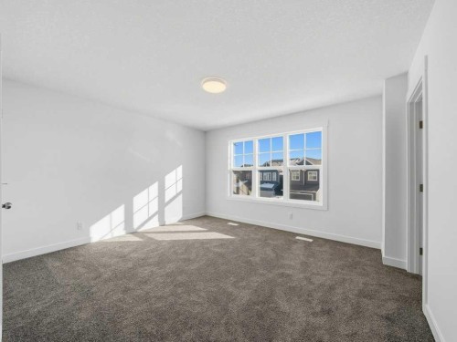 105 Creekstone Manor Sw, Calgary, AB - Indoor Photo Showing Other Room
