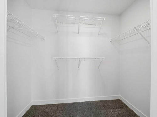 105 Creekstone Manor Sw, Calgary, AB - Indoor With Storage
