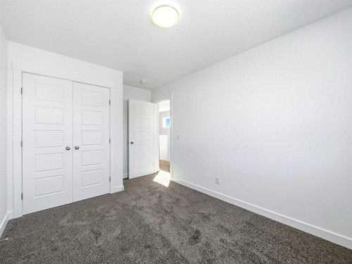 105 Creekstone Manor Sw, Calgary, AB - Indoor Photo Showing Other Room