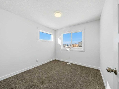 105 Creekstone Manor Sw, Calgary, AB - Indoor Photo Showing Other Room