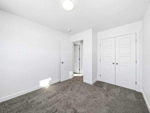 105 Creekstone Manor Sw, Calgary, AB - Indoor Photo Showing Other Room