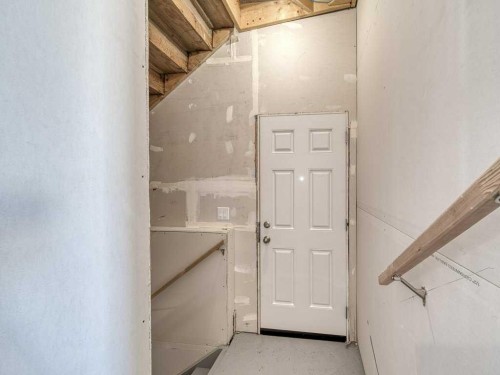 105 Creekstone Manor Sw, Calgary, AB - Indoor Photo Showing Other Room