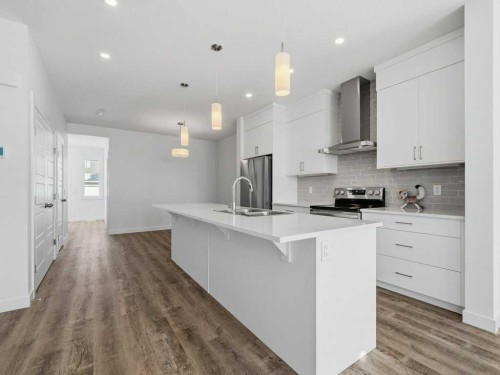 105 Creekstone Manor Sw, Calgary, AB - Indoor Photo Showing Kitchen With Upgraded Kitchen