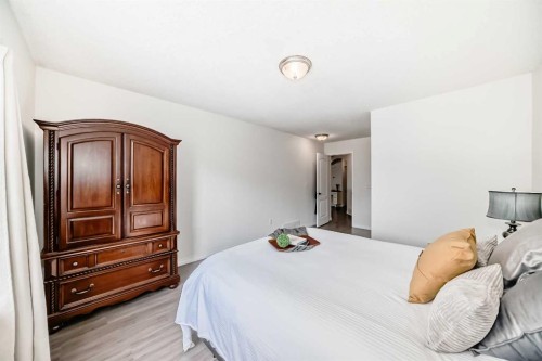 69 Canals Circle Sw, Airdrie, AB - Indoor Photo Showing Bedroom