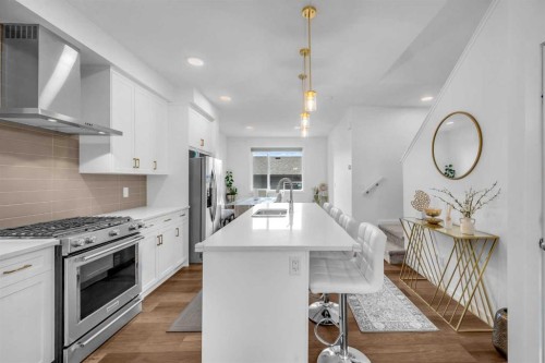 84 Savanna Place Ne, Calgary, AB - Indoor Photo Showing Kitchen With Double Sink With Upgraded Kitchen