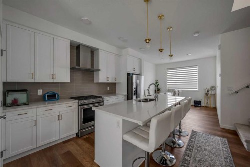 84 Savanna Place Ne, Calgary, AB - Indoor Photo Showing Kitchen With Double Sink With Upgraded Kitchen