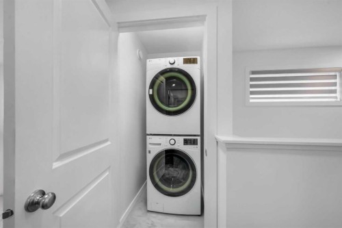 84 Savanna Place Ne, Calgary, AB - Indoor Photo Showing Laundry Room
