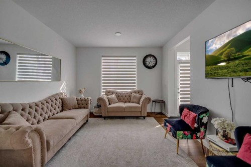 84 Savanna Place Ne, Calgary, AB - Indoor Photo Showing Living Room
