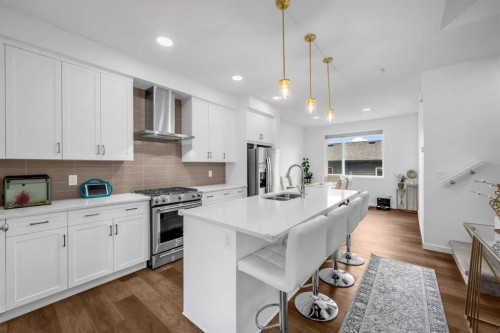 84 Savanna Place Ne, Calgary, AB - Indoor Photo Showing Kitchen With Double Sink With Upgraded Kitchen