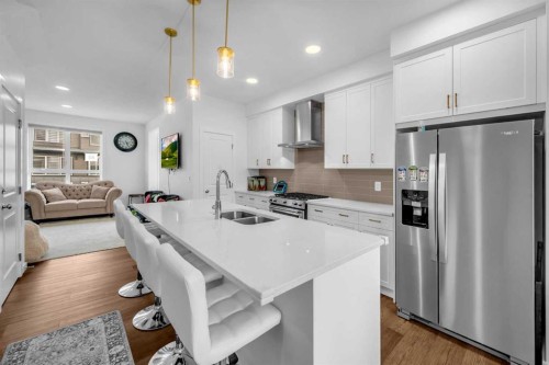 84 Savanna Place Ne, Calgary, AB - Indoor Photo Showing Kitchen With Double Sink With Upgraded Kitchen