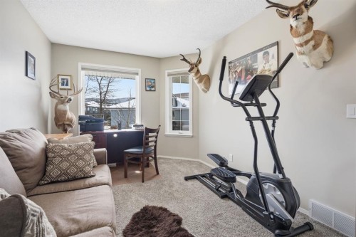 216 Valley Ridge Heights Nw, Calgary, AB - Indoor Photo Showing Gym Room