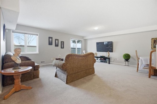216 Valley Ridge Heights Nw, Calgary, AB - Indoor Photo Showing Living Room
