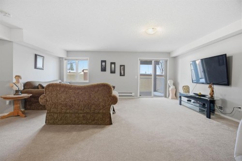216 Valley Ridge Heights Nw, Calgary, AB - Indoor Photo Showing Living Room