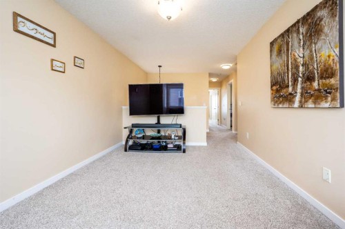 60 Covecreek Mews Ne, Calgary, AB - Indoor Photo Showing Other Room