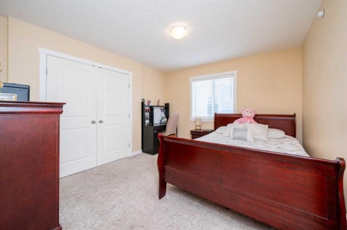 60 Covecreek Mews Ne, Calgary, AB - Indoor Photo Showing Bedroom