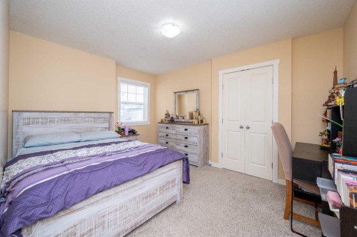 60 Covecreek Mews Ne, Calgary, AB - Indoor Photo Showing Bedroom