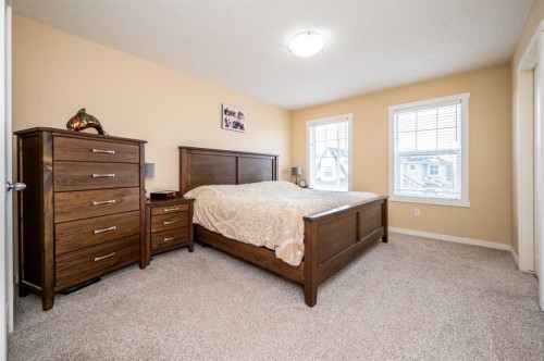 60 Covecreek Mews Ne, Calgary, AB - Indoor Photo Showing Bedroom