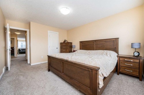 60 Covecreek Mews Ne, Calgary, AB - Indoor Photo Showing Bedroom
