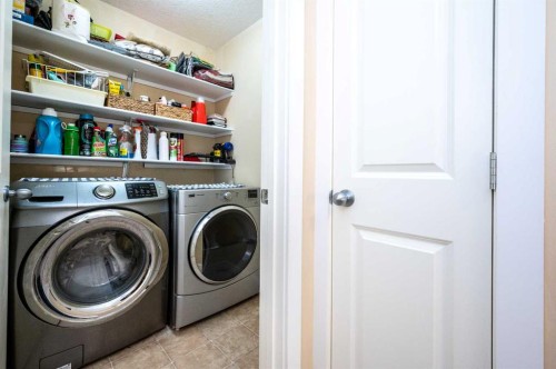 60 Covecreek Mews Ne, Calgary, AB - Indoor Photo Showing Laundry Room