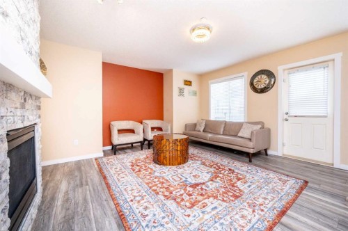 60 Covecreek Mews Ne, Calgary, AB - Indoor Photo Showing Living Room With Fireplace