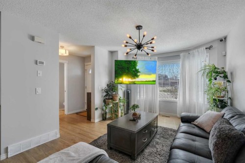 179 Saddlemead Road Ne, Calgary, AB - Indoor Photo Showing Living Room