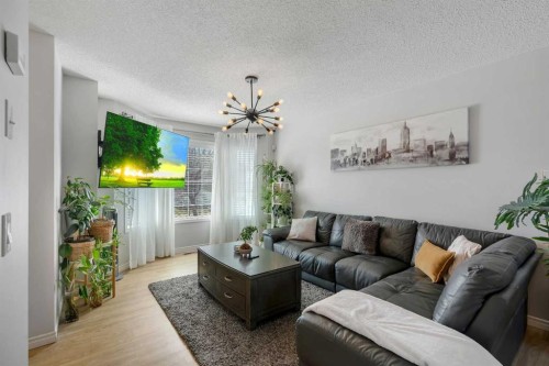 179 Saddlemead Road Ne, Calgary, AB - Indoor Photo Showing Living Room