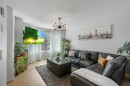 179 Saddlemead Road Ne, Calgary, AB  - Indoor Photo Showing Living Room 