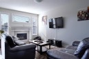 193 Redstone Common Ne, Calgary, AB  - Indoor Photo Showing Living Room With Fireplace 