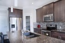 193 Redstone Common Ne, Calgary, AB  - Indoor Photo Showing Kitchen With Stainless Steel Kitchen With Double Sink With Upgraded Kitchen 