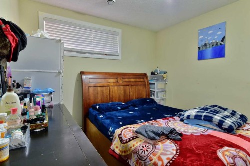 18 Redstone Manor Ne, Calgary, AB - Indoor Photo Showing Bedroom