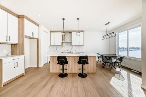 122 Waterstone Way, Chestermere, AB - Indoor Photo Showing Kitchen With Double Sink