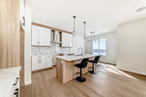 122 Waterstone Way, Chestermere, AB - Indoor Photo Showing Kitchen With Upgraded Kitchen