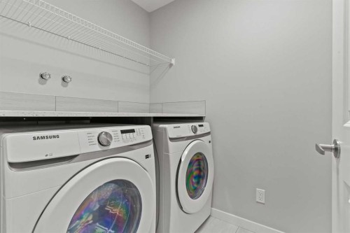 109 Mallard Grove Se, Calgary, AB - Indoor Photo Showing Laundry Room