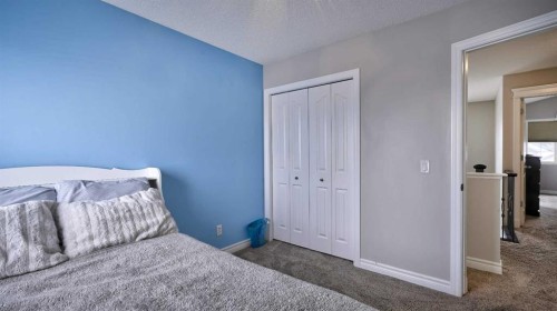 139 Coopers Close Sw, Airdrie, AB - Indoor Photo Showing Bedroom