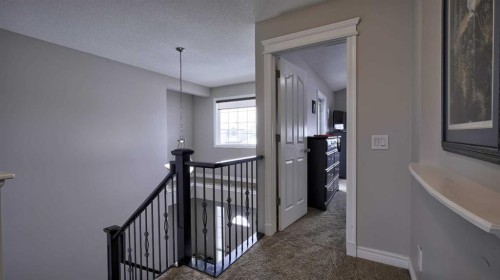 139 Coopers Close Sw, Airdrie, AB - Indoor Photo Showing Other Room