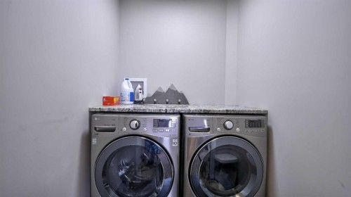 139 Coopers Close Sw, Airdrie, AB - Indoor Photo Showing Laundry Room