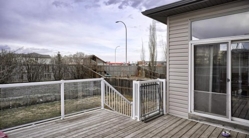 139 Coopers Close Sw, Airdrie, AB - Outdoor With Deck Patio Veranda With Exterior