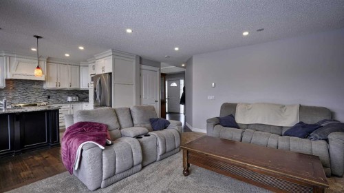 139 Coopers Close Sw, Airdrie, AB - Indoor Photo Showing Living Room