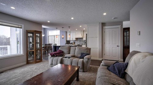 139 Coopers Close Sw, Airdrie, AB - Indoor Photo Showing Living Room