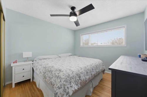 140 Waterloo Drive Sw, Calgary, AB - Indoor Photo Showing Bedroom