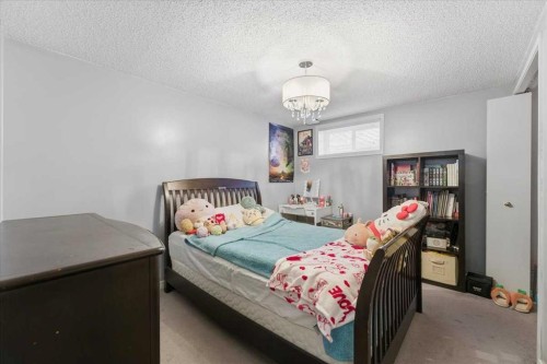 140 Waterloo Drive Sw, Calgary, AB - Indoor Photo Showing Bedroom