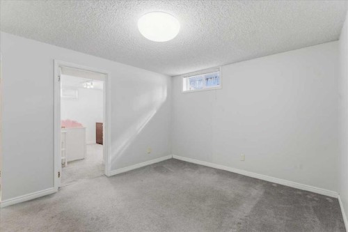 140 Waterloo Drive Sw, Calgary, AB - Indoor Photo Showing Other Room