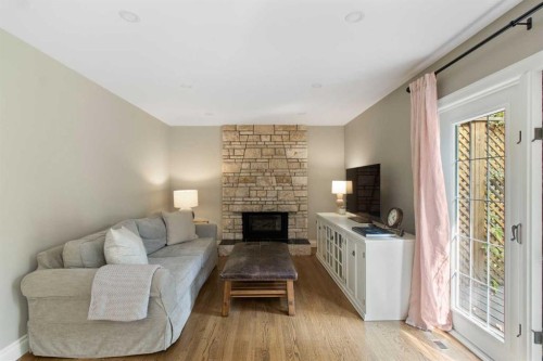152 Lake Mead Crescent Se, Calgary, AB - Indoor Photo Showing Living Room With Fireplace