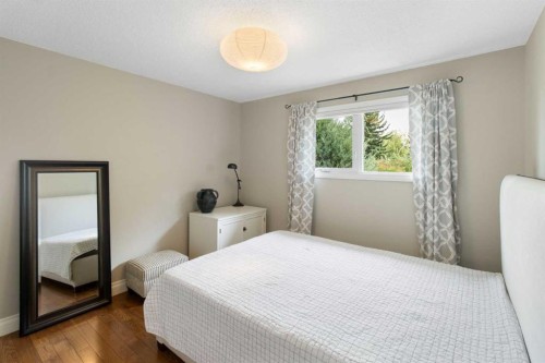 152 Lake Mead Crescent Se, Calgary, AB - Indoor Photo Showing Bedroom