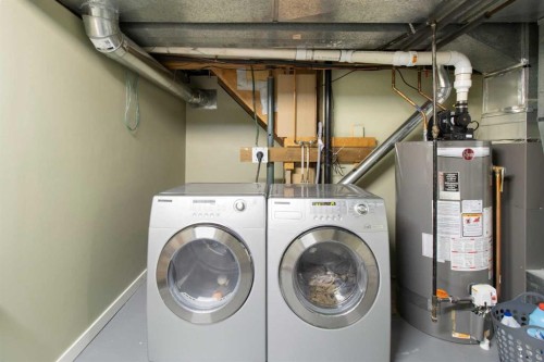 152 Lake Mead Crescent Se, Calgary, AB - Indoor Photo Showing Laundry Room