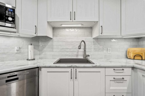 2111 Millrise Point Sw, Calgary, AB - Indoor Photo Showing Kitchen With Upgraded Kitchen