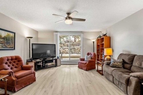 2111 Millrise Point Sw, Calgary, AB - Indoor Photo Showing Living Room